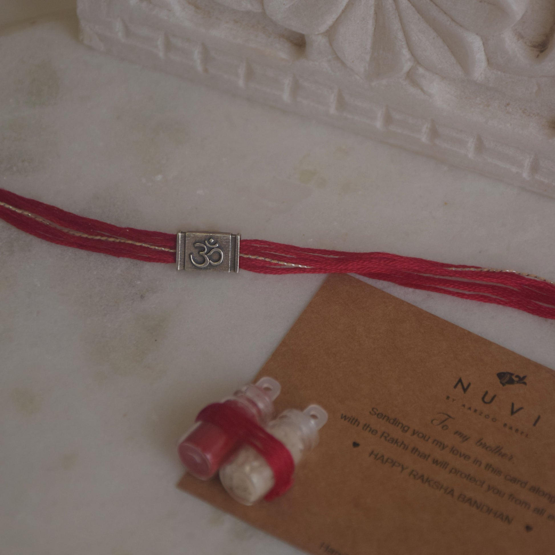 Handcrafted 925 sterling silver rakhi with Om charm