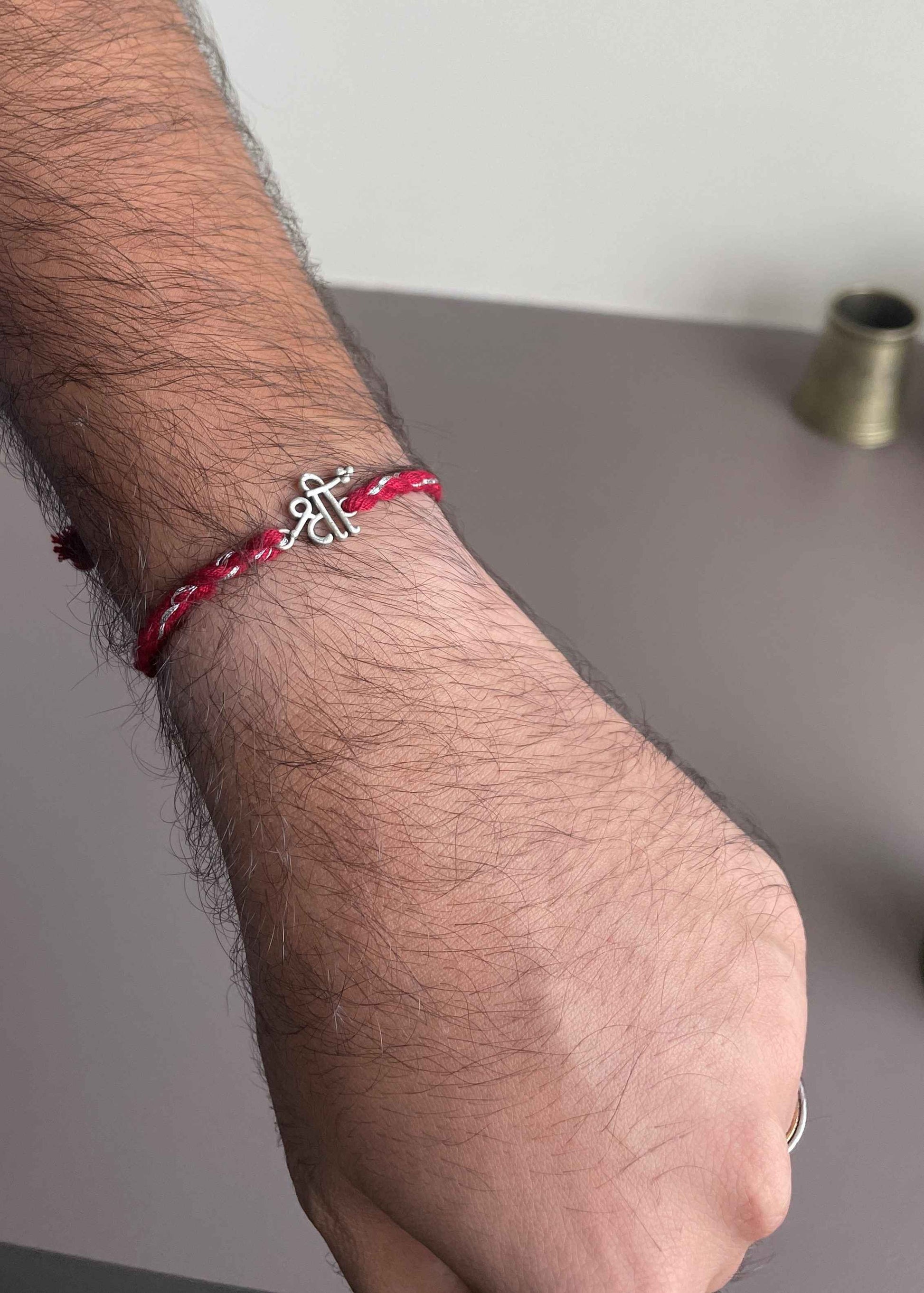 Premium Shree 925 Sterling Silver Rakhi crafted with intricate symbolic detailing and luxurious festive artistry for meaningful gifting.