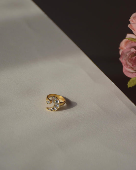 Chand adjustable ring handcrafted in 925 sterling silver with 22K gold plating, featuring a minimalist Jadau chand design adorned with white Jadau stones.