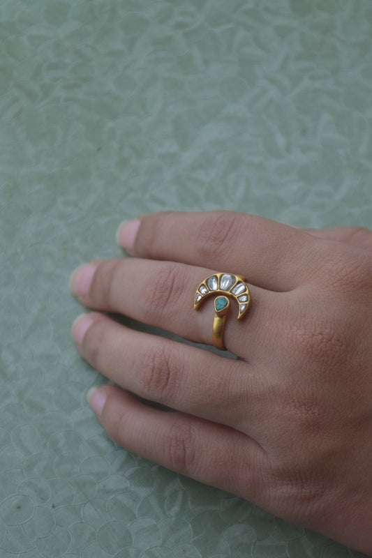 Chand Firoza adjustable ring in 925 sterling silver with 22K gold plating, featuring a minimalist Jadau chand design embellished with white Jadau stones and a central Firoza stone.