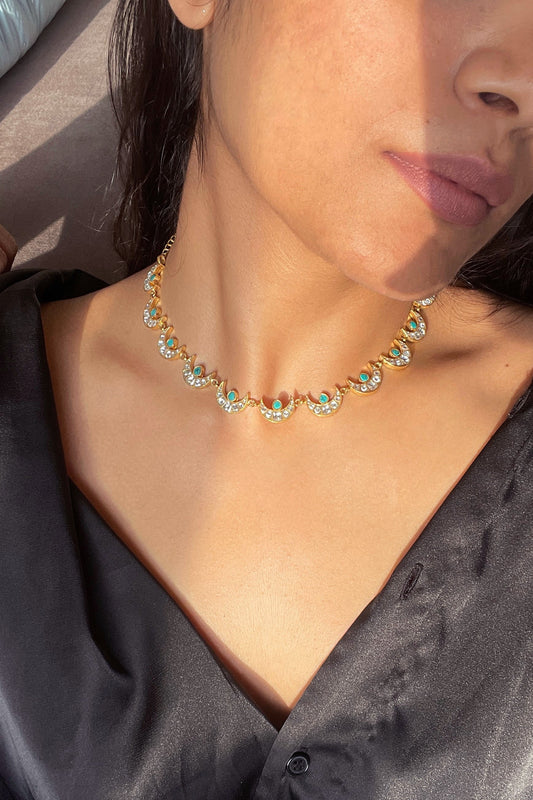 Chand Firoza Necklace in 925 silver with 22K gold plating, featuring intricate jadau chand motifs embellished with white jadau stones and a central Firoza stone