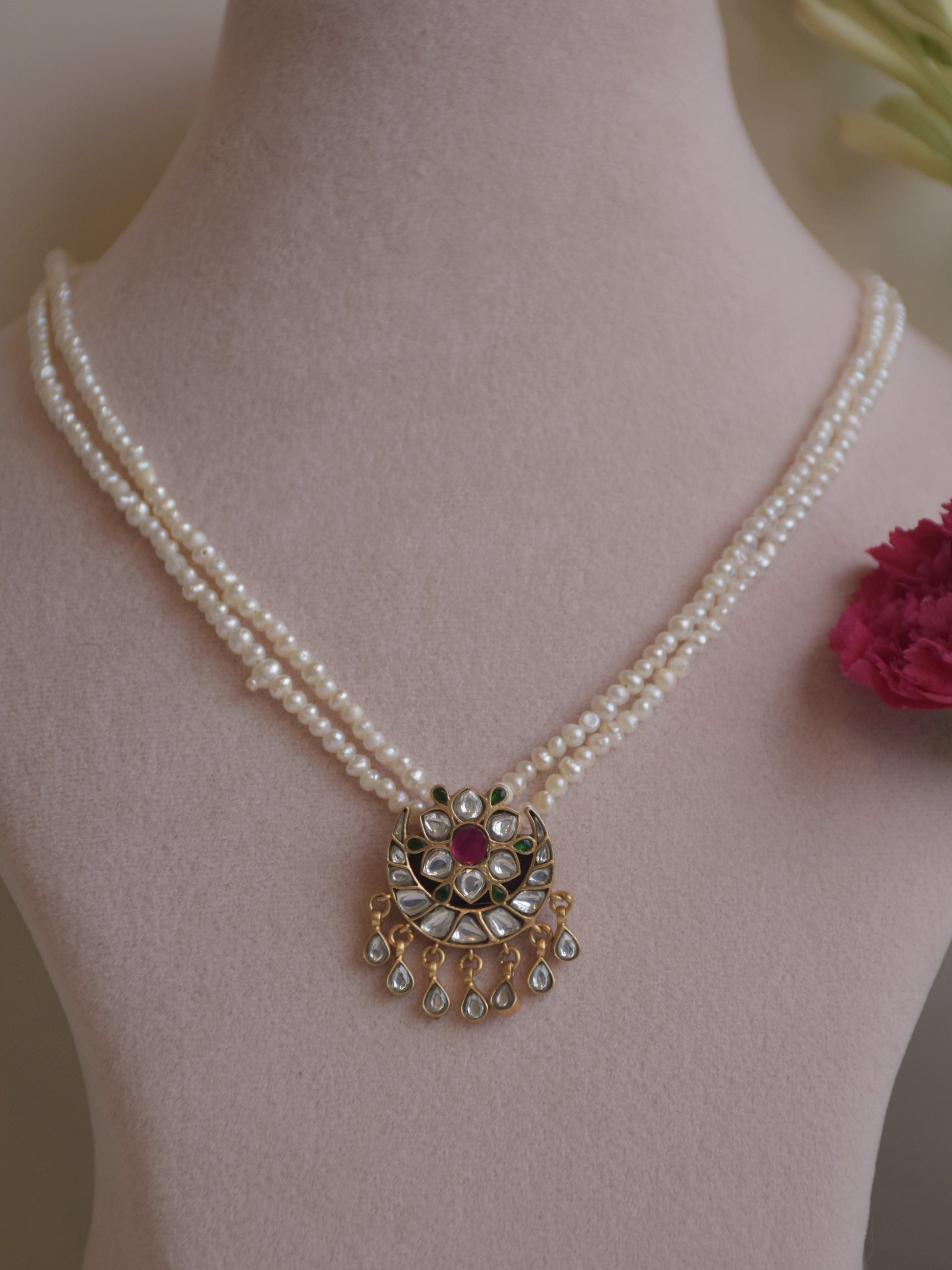 Elegant Chand Phool gold-plated silver pendant, featuring traditional Jadau design with pearl accents for heritage-inspired styling.