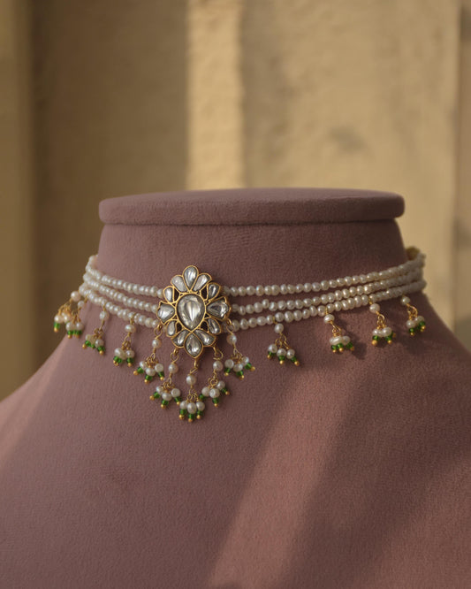 Charu choker necklace in 92.5 sterling silver, featuring a delicate floral motif with white Jadau stones and freshwater pearls.