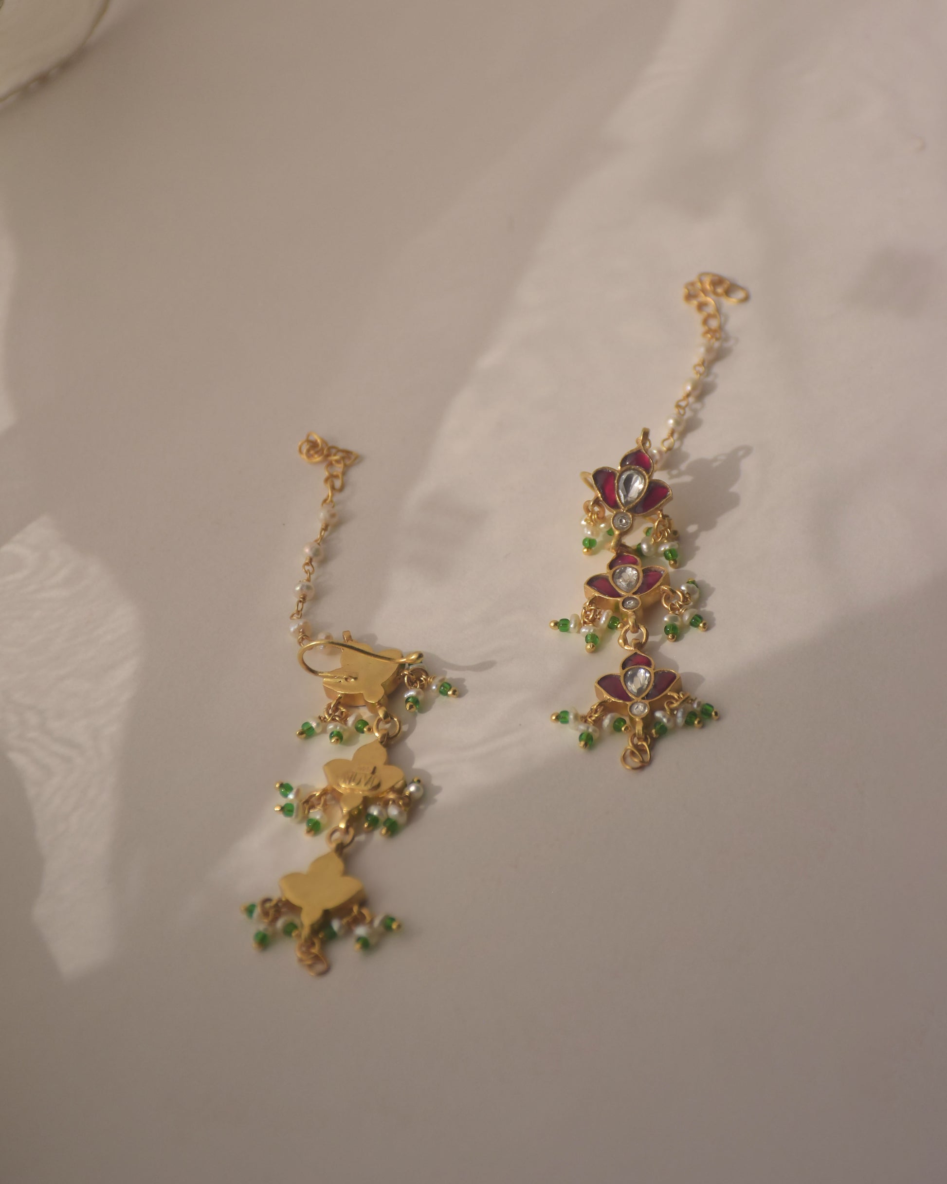 Elegant pink enamel ear chain in 925 silver inspired by timeless Indian jewelry traditions | NUVI JEWELS