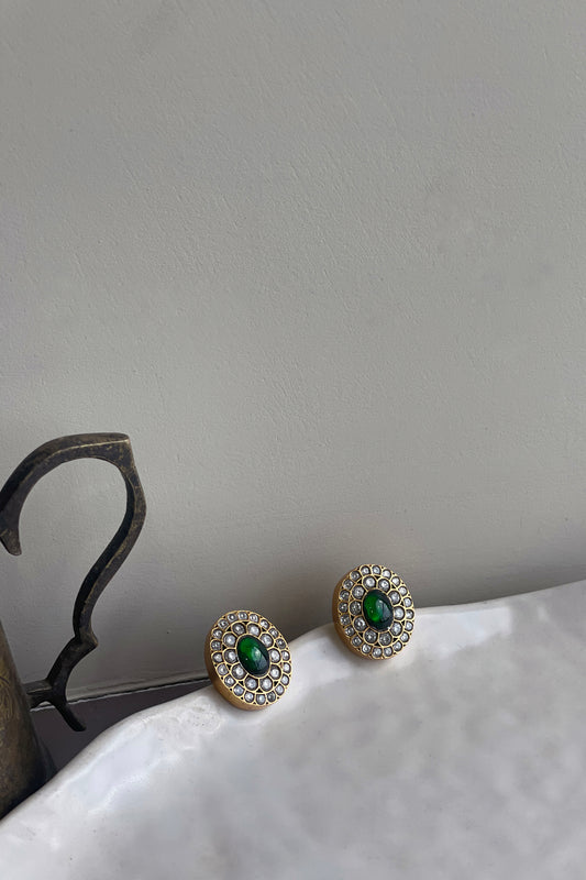 
Damini 925 silver earstuds with intricate white Jadau stonework and a central green stone.