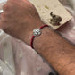 Handcrafted 925 sterling silver rakhi with elegant Ganesha charm detailing