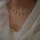 Dori Necklace handcrafted in 925 silver with gold polish, featuring petal-shaped jadau units and lustrous freshwater pearls, including a single pearl drop.