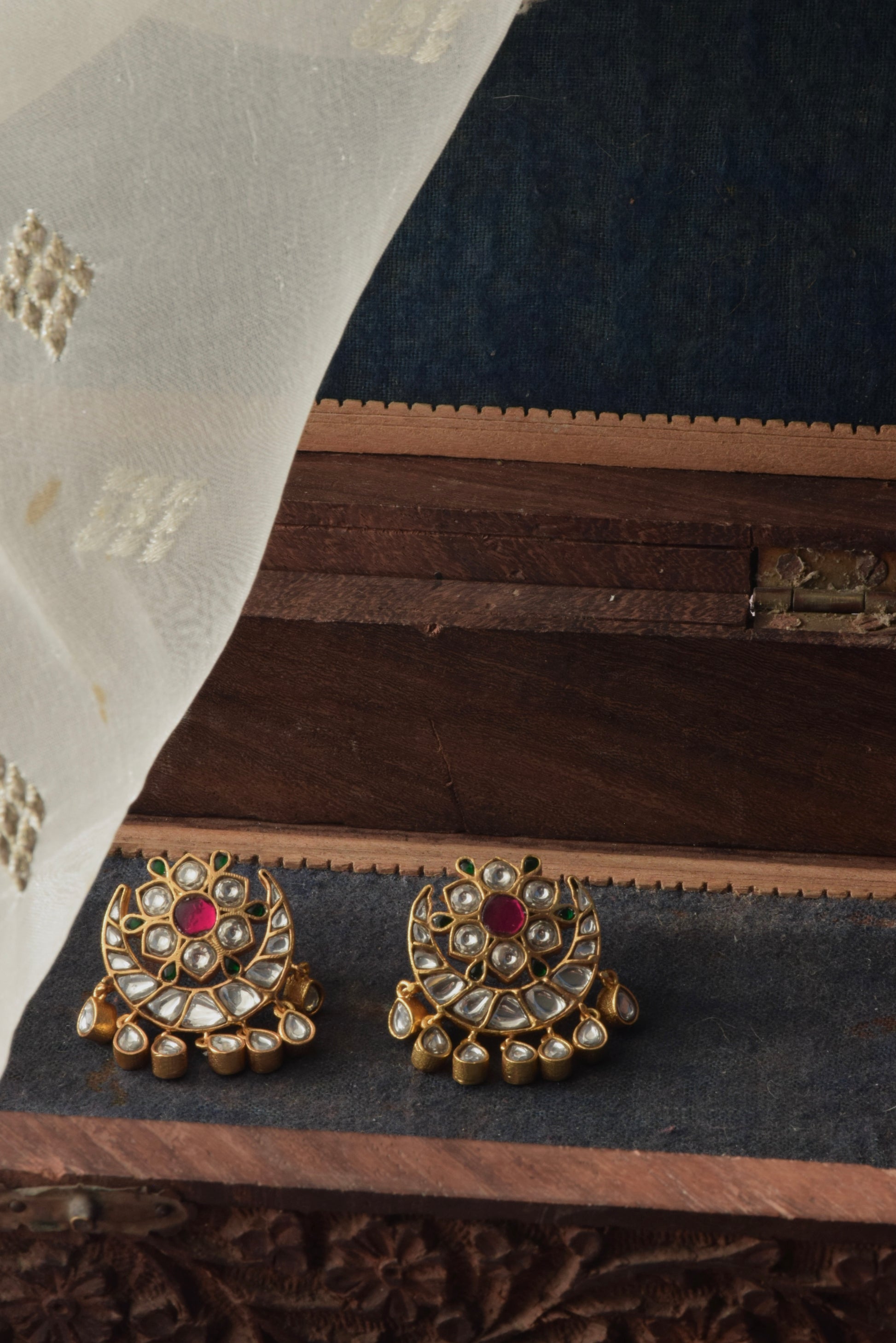 Elegant Chand Phool Earstuds handcrafted in 925 silver with gold polish, adorned with sparkling Jadau stones, perfect for festive, wedding, and ethnic Indian styling.