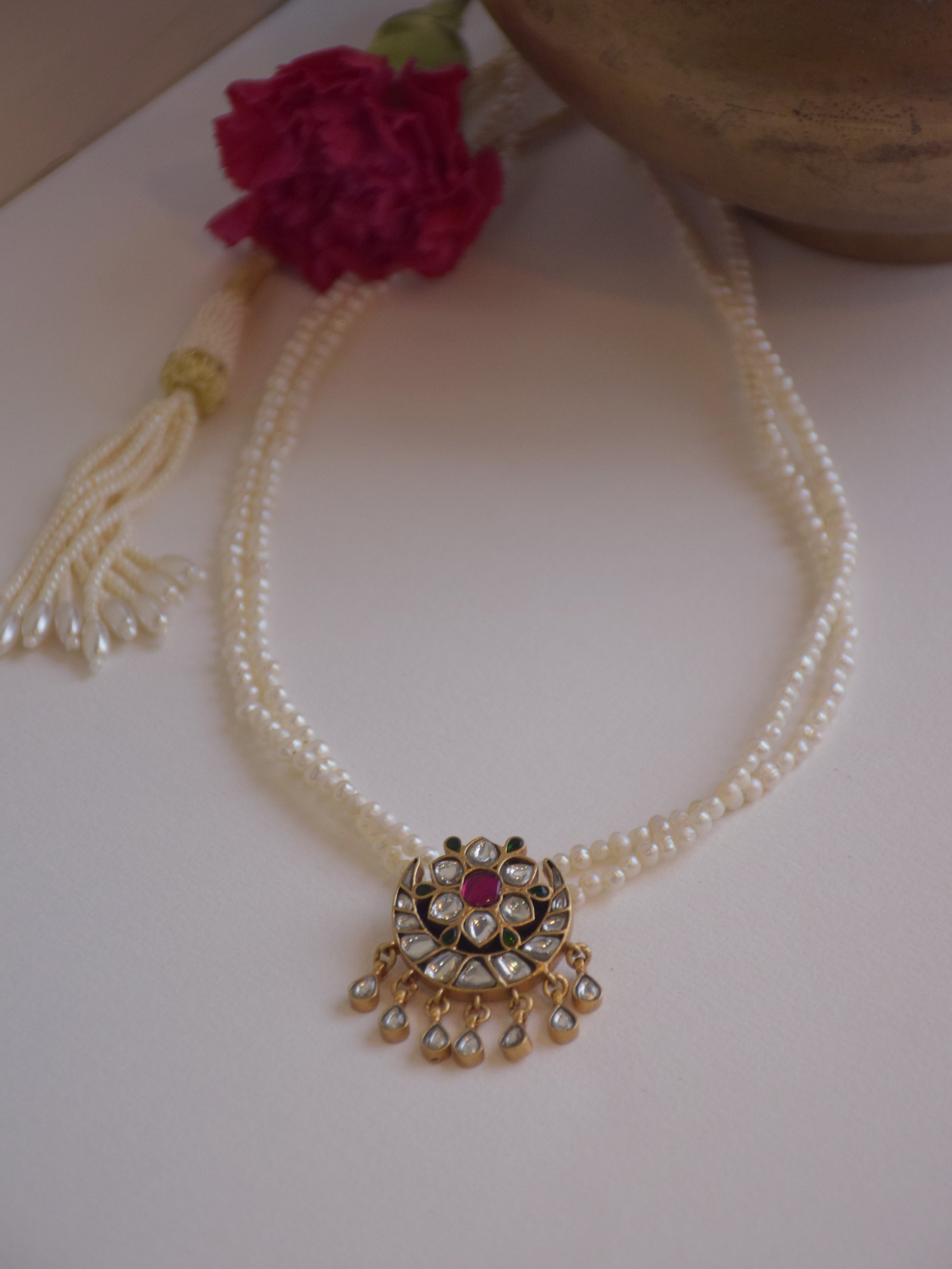 Traditional Jadau necklace in 925 silver with gold plating, showcasing delicate floral Kundan motifs and timeless elegance.