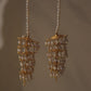 Handcrafted silver ear chain jewelry with intricate jhumki accents, festive statement piece by NUVI JEWELS