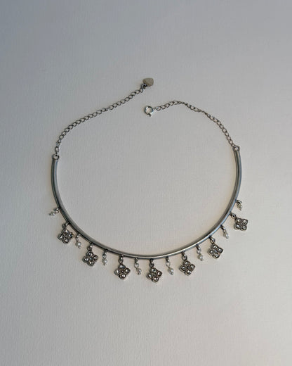 Nuvi Jewels Madhura Hasli in sterling silver gold plated featuring delicate flowers and dangling pearls