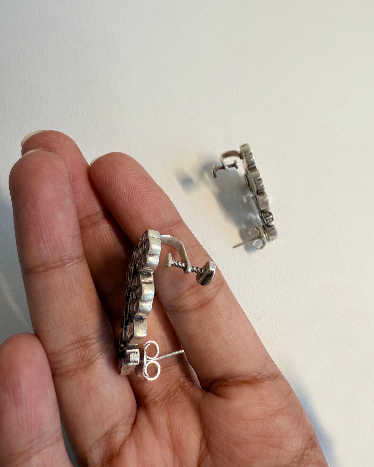 Handcrafted Nuvi Jewels Laasya Earcuffs in 92.5 silver gold plated featuring intricate floral motifs and secure screw clip