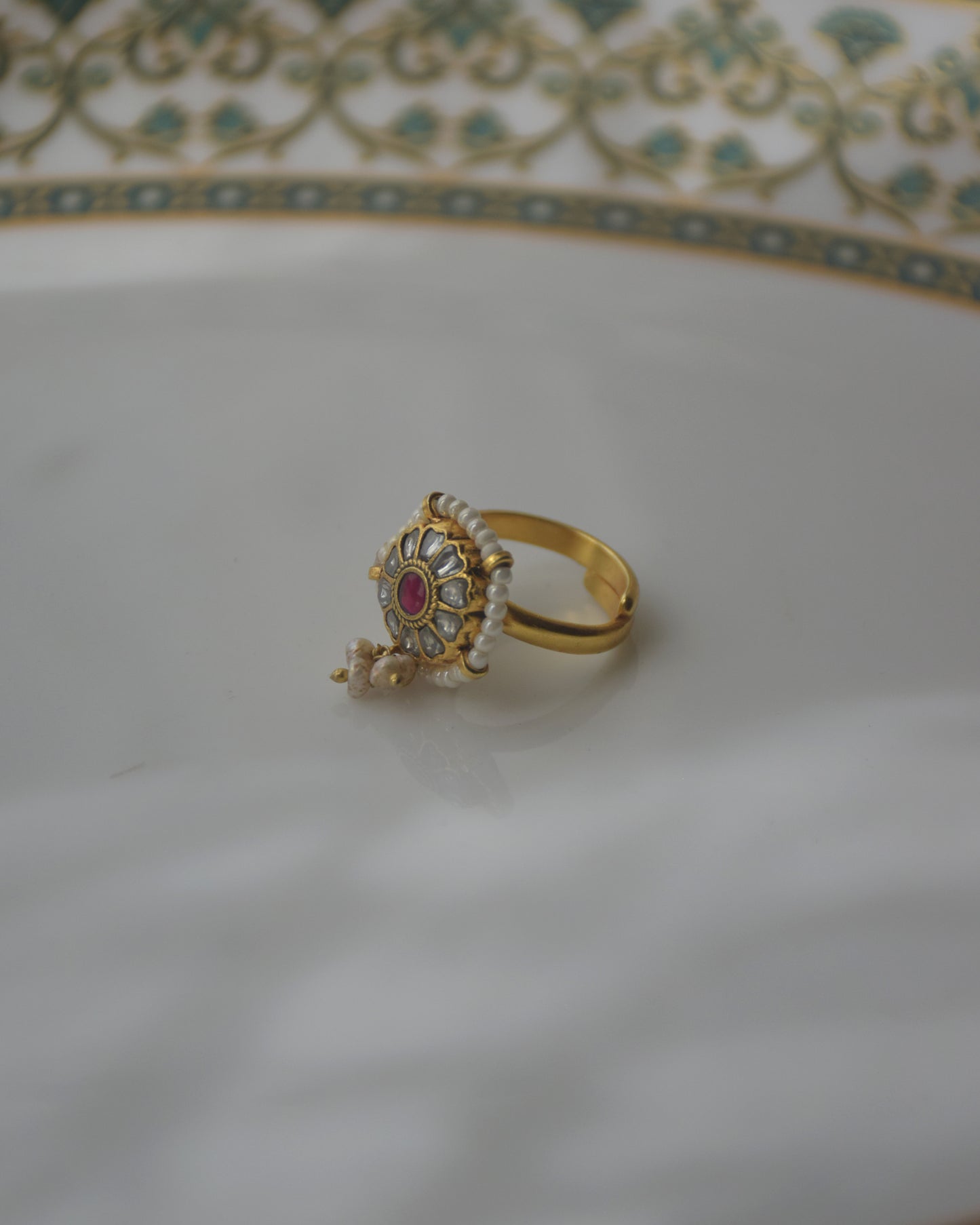 Traditional Indian jadau ring by Nuvi Jewels crafted in 925 sterling silver with gold plating