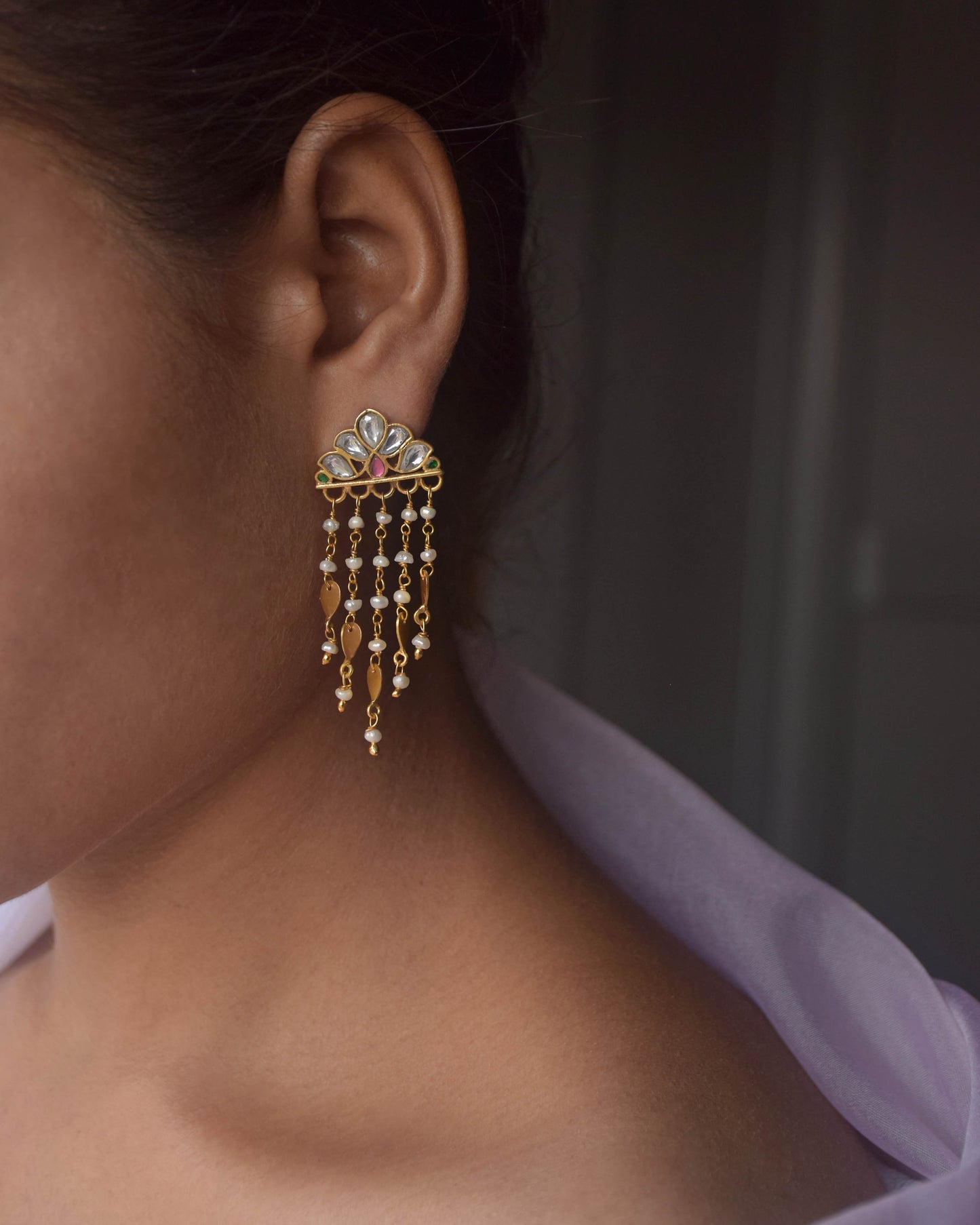 Elegant Indian earrings in sterling silver with gold plating, floral Jadau stones, and pearl drops