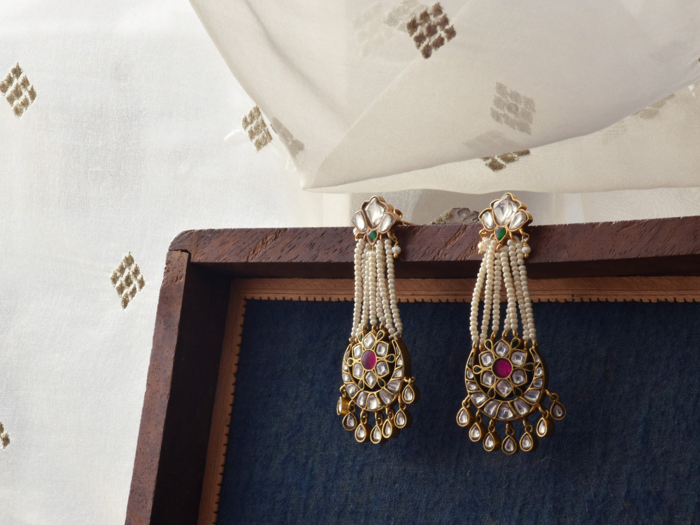 crafted earrings in 92.5 sterling silver, featuring a vibrant array of hand-cut multicolored Jadau stones.