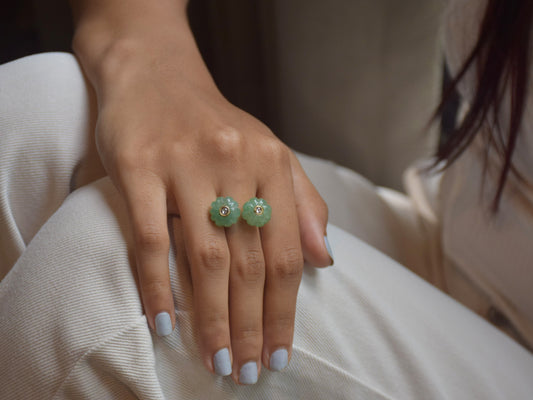 Guftagoo cocktail ring featuring large, mesmerizing pumpkin gemstones.