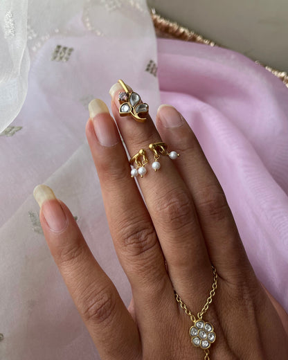 Nuvi Jewels Floral Nail Ring in 92.5 silver with adjustable floral motif and hanging freshwater pearls