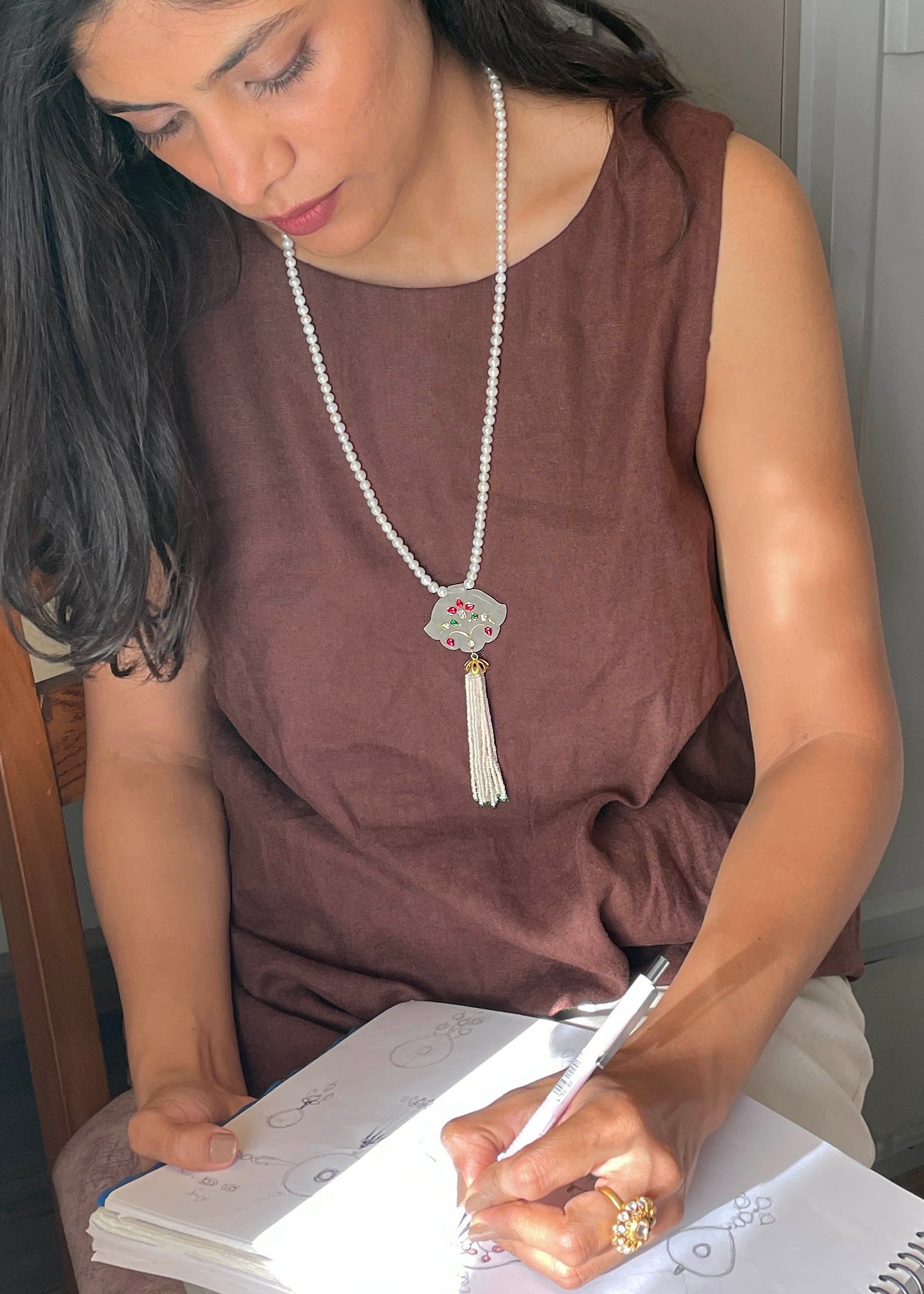 Gold finish 925 silver Chakori necklace featuring white quartz and intricate gemstone inlay work | NUVI JEWELS