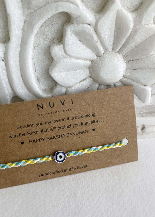 Kids’ Rakhi made from 925 silver, featuring a cute enamel evil eye charm for good luck and protection.