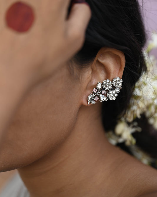 Laasya Earcuffs with intricate floral motifs in silver, featuring a secure screw mechanism for adjustable and comfortable fit .