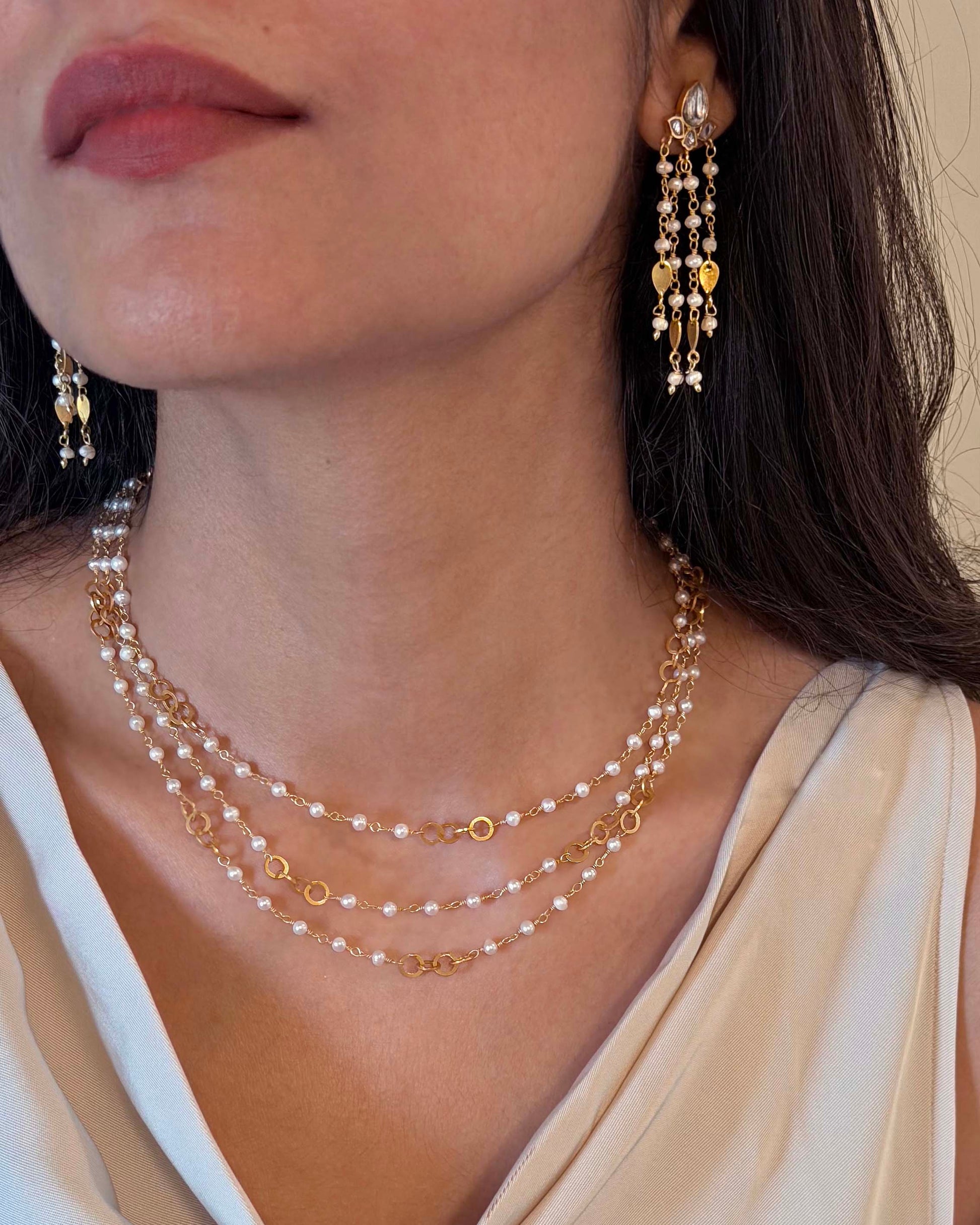Three-layer silver pearl necklace with circular link work, handcrafted by NUVI JEWELS