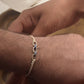 Designer Silver Rakhi Buy Online – Link Chain 925 Chandi Rakhi for Brother India	NUVI JEWELS
