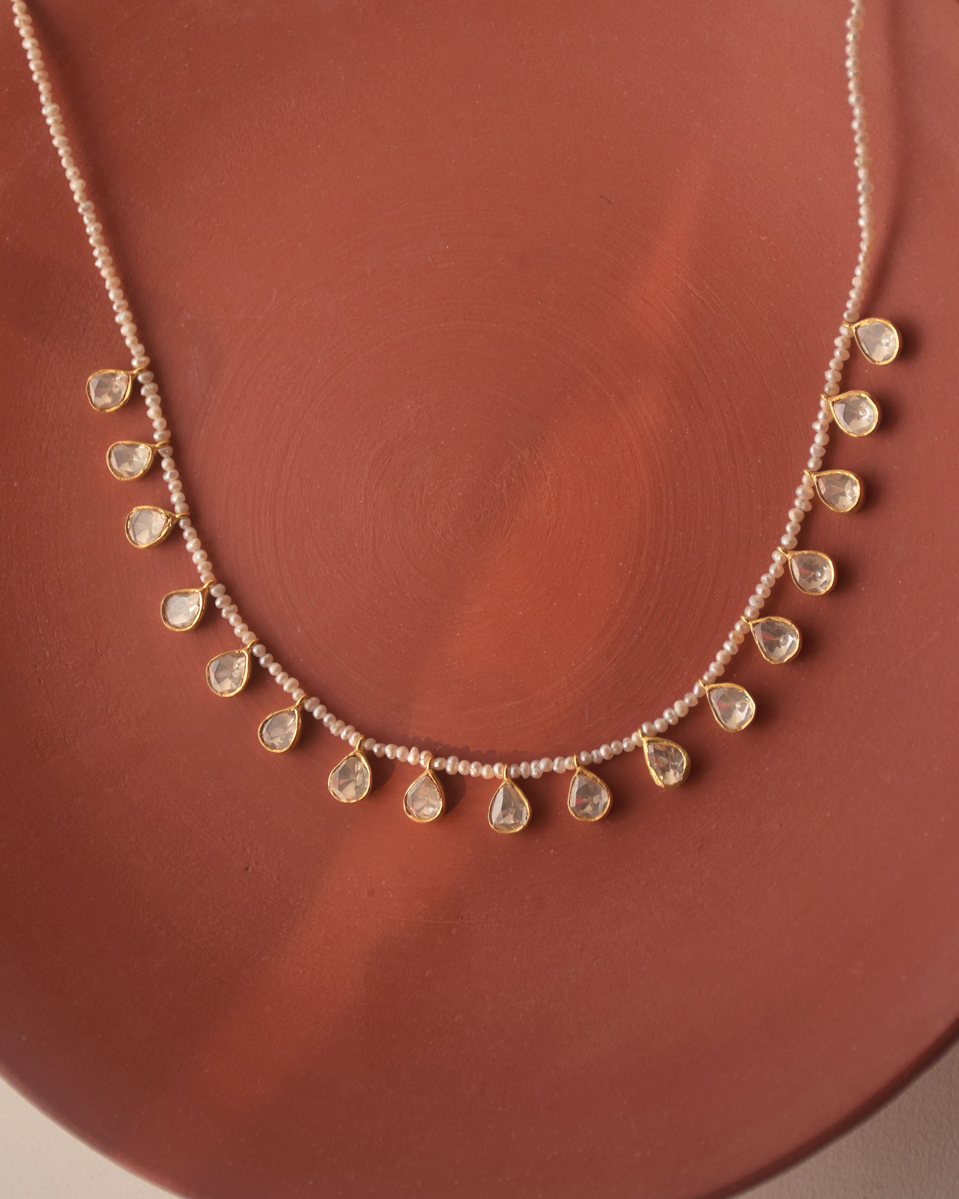 Nuvi Jewels moissanite round necklace crafted in 925 sterling silver with gold plated finish