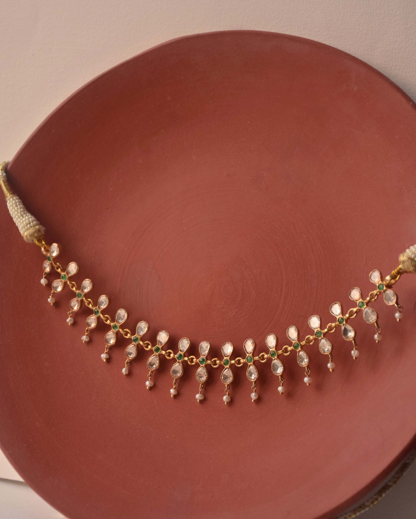 925 Silver polki necklace with pearls and green stones.