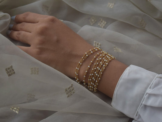 Musafiri Freshwater Pearl Bracelet featuring lustrous natural pearls.