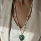 Artisanal Navya long necklace made of hallmarked 925 silver, showcasing a unique hand-carved green quartz stone and delicate polki, on a premium freshwater rice pearl mala.