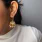 Noor Jhumka Earrings handcrafted in 925 silver featuring elegant fish hoop design with delicate pear drop accents.