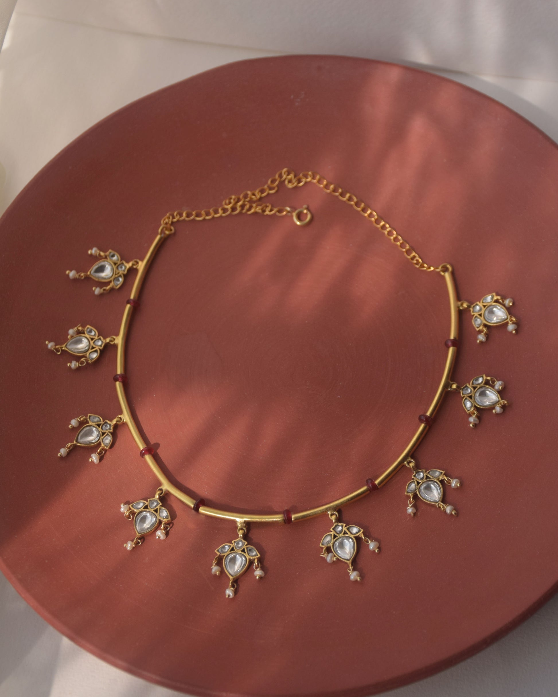 Reimagined 925 silver hasli with gold finish, pink beads, floral motifs, and cascading freshwater pearls.