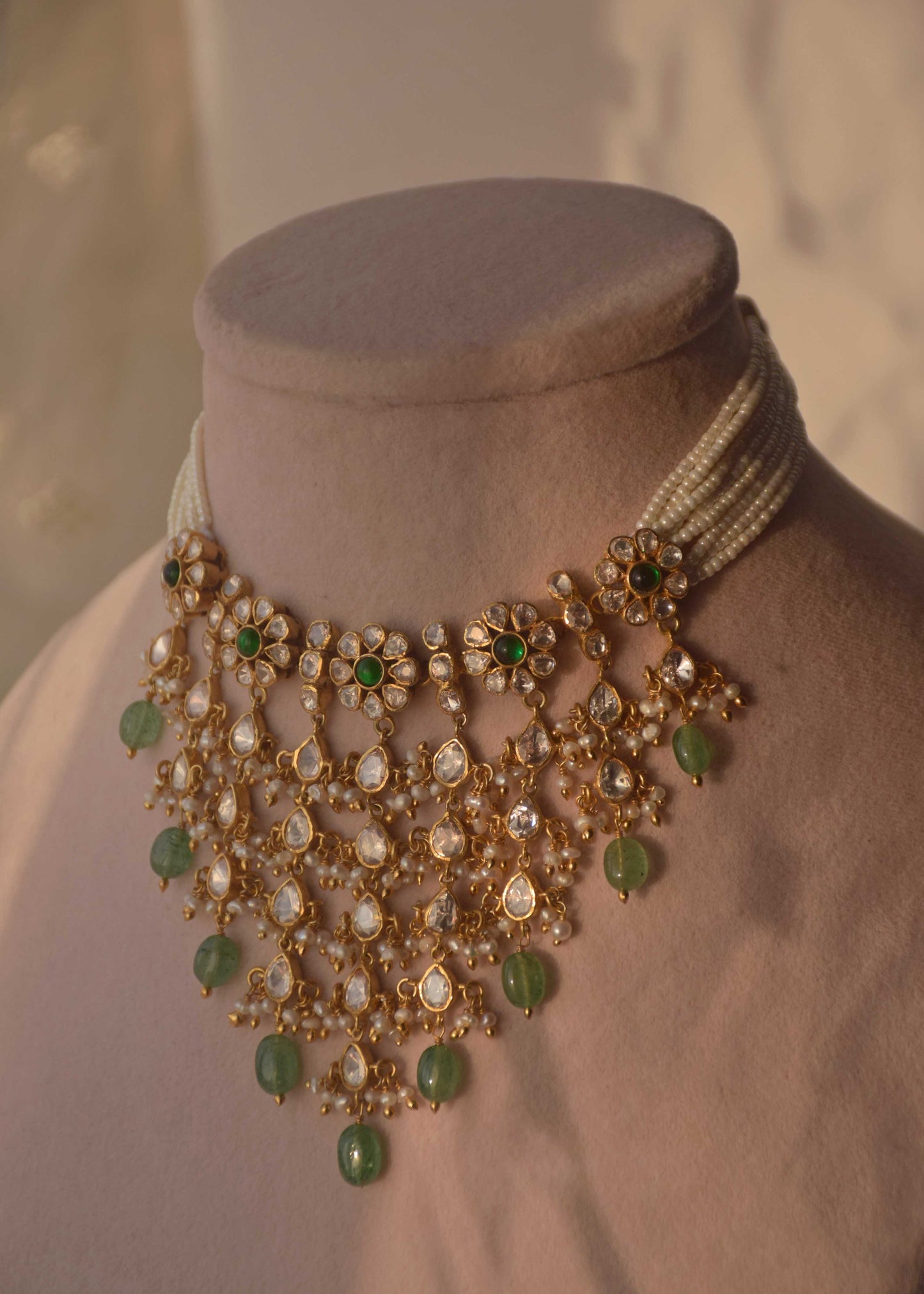 Handcrafted Nuvi Jewels Polki choker in 925 silver with gold plating, samosa daak floral motifs, pearl drops and green beads