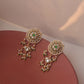 Traditional Nuvi Jewels earrings crafted in 925 silver with gold plating and pearl accents