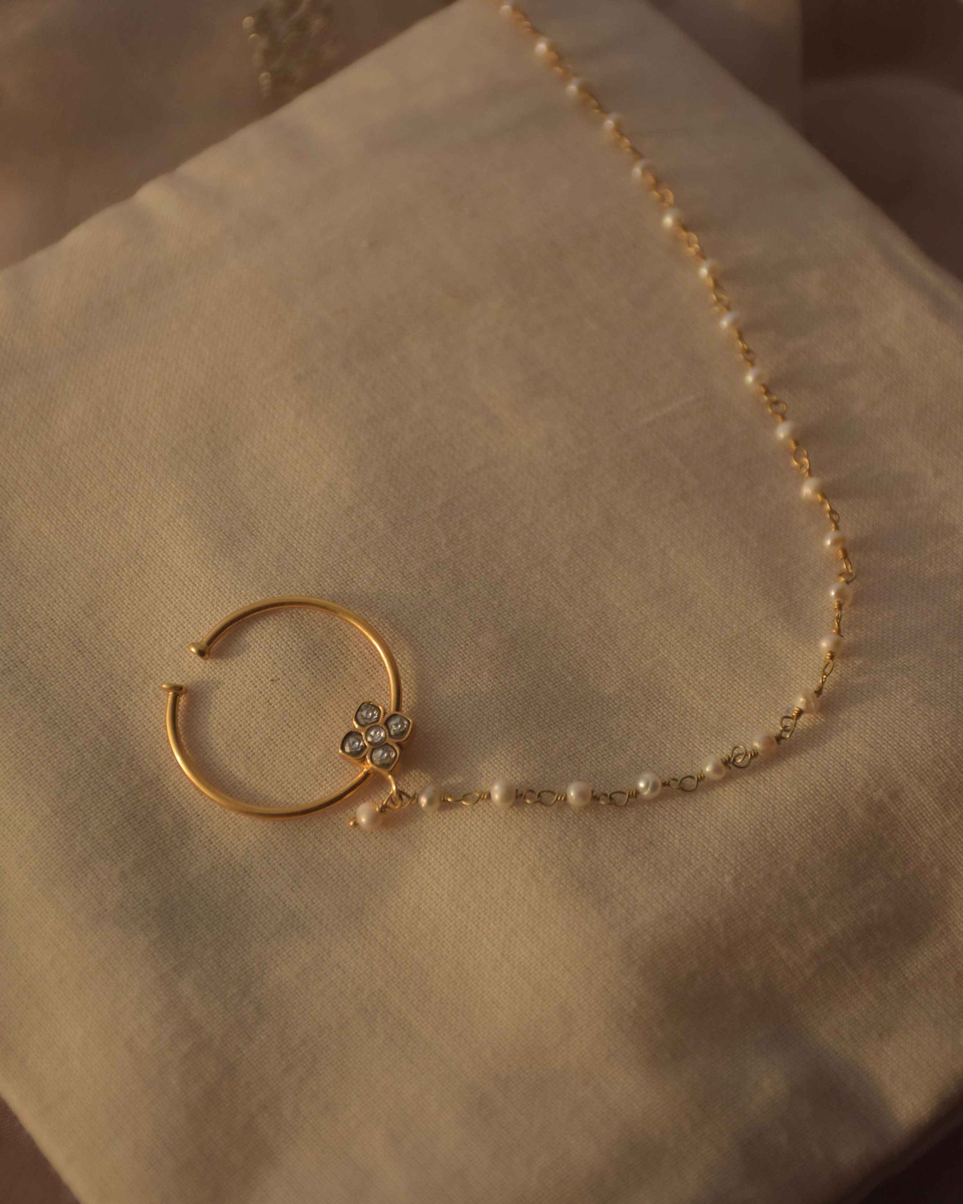 Traditional Indian jadau nath by Nuvi Jewels crafted in 925 sterling silver with gold plating