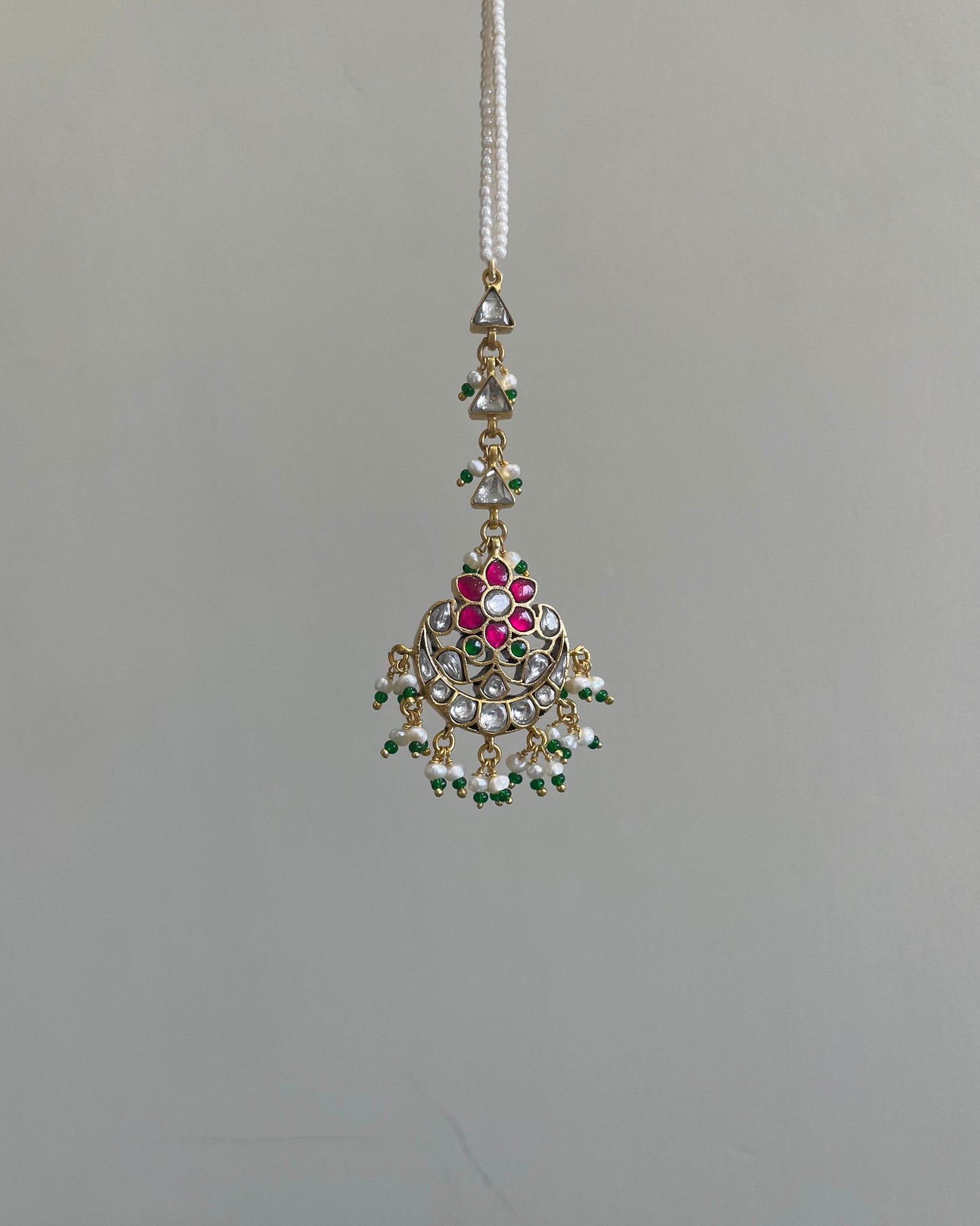 Elegant Nuvi Jewels mangtikka made in 92.5 silver with gold plated finish