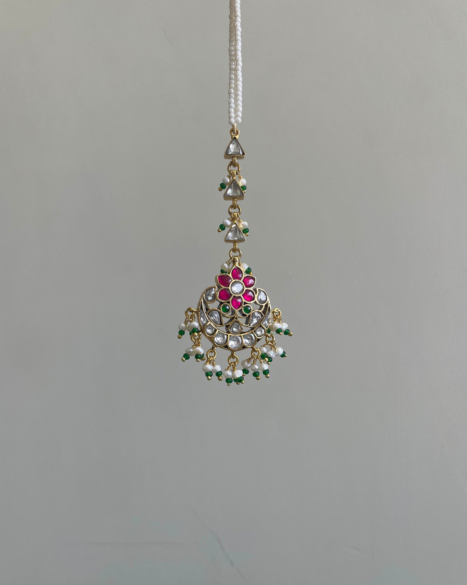 Elegant Nuvi Jewels mangtikka made in 92.5 silver with gold plated finish