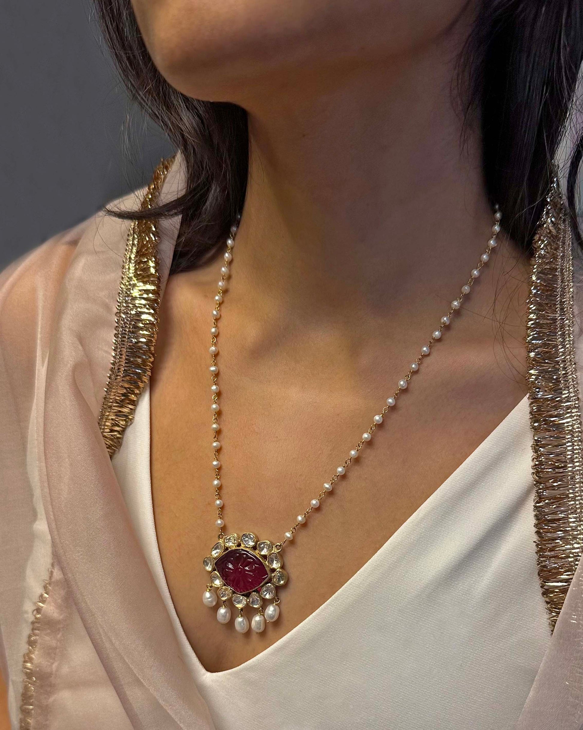 Handcrafted Nuvi Jewels pendant in 925 silver with gold plating, pink stone centerpiece and polki accents