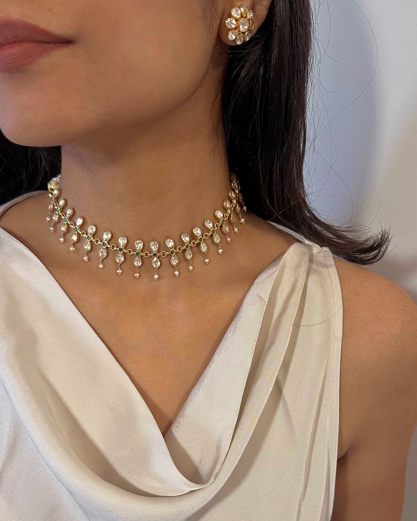 Gold-plated 925 silver Polki choker featuring drop-shaped Belur Polki in samosa daak setting with a subtle green stone accent.