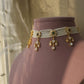 Ruhani Polki Choker handcrafted in 92.5 sterling silver with gold plating, featuring round floral motifs adorned with hand-set Polki stones using the traditional samosa daak technique. Delicate petal-shaped Polki drops add graceful movement.