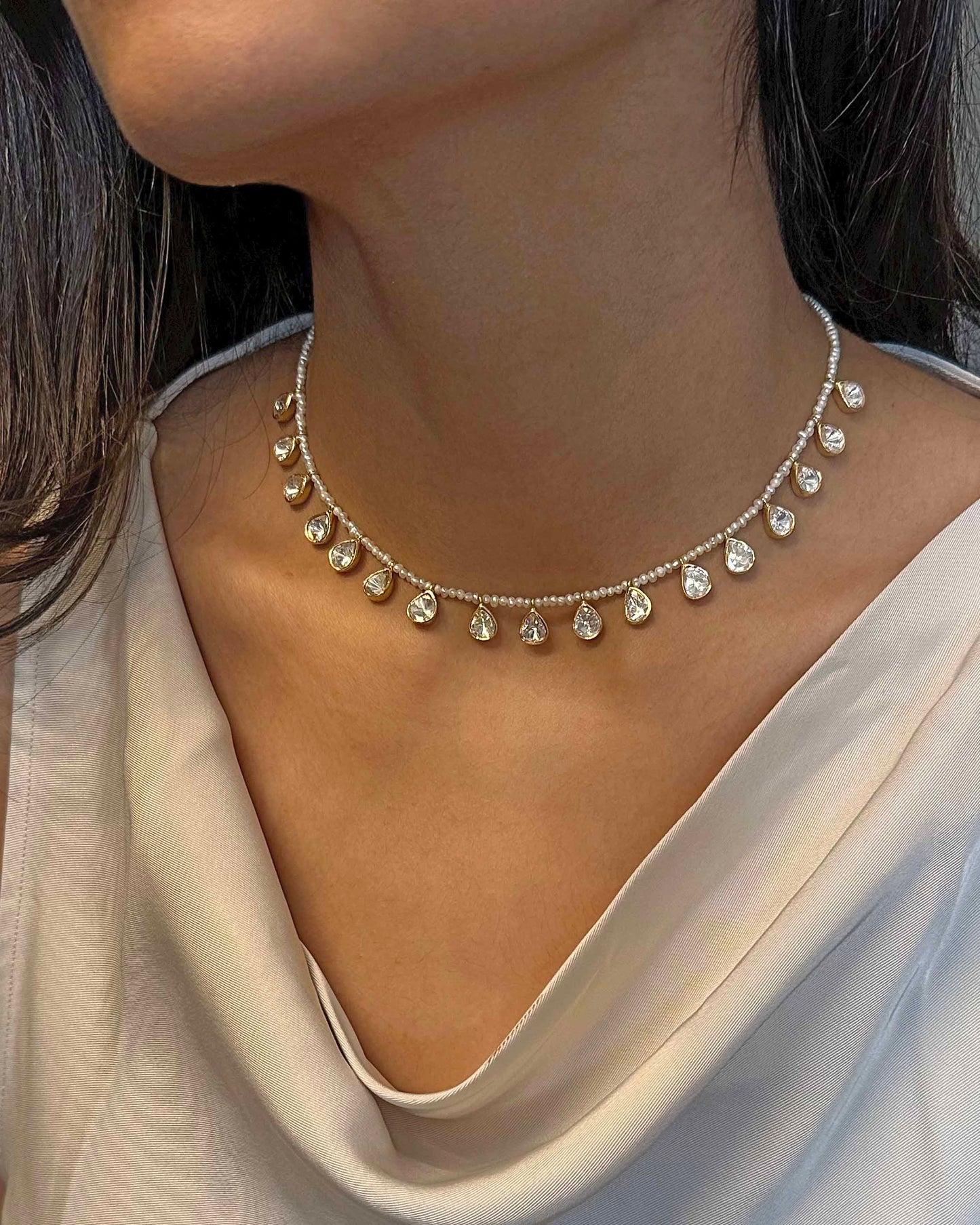Elegant Nuvi Jewels necklace featuring Samosa Daak polki stones and freshwater pearls in sterling silver