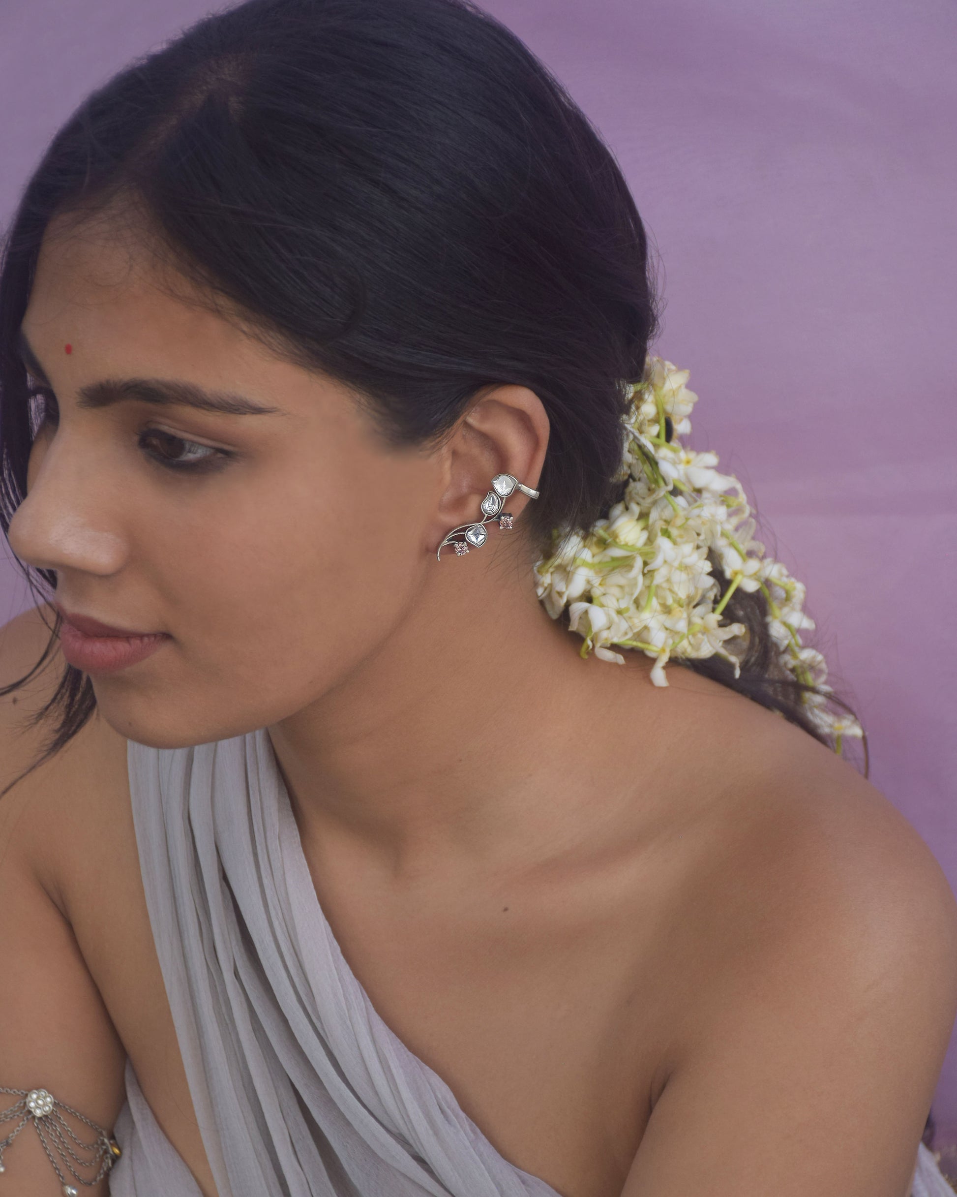 Handcrafted Nuvi Jewels Kumudini Earcuffs in 92.5 silver featuring floral motifs and secure cuff clip for comfort