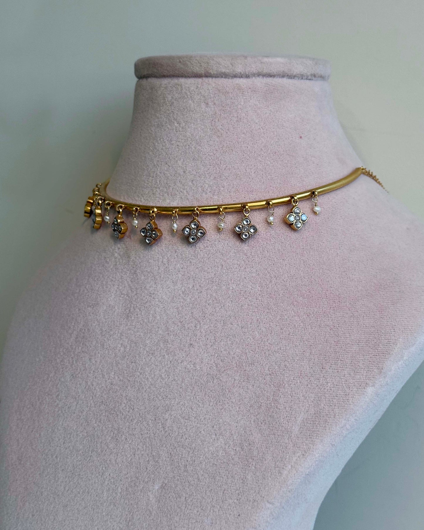 Nuvi Jewels designer Madhura Hasli in 92.5 silver featuring handcrafted floral motifs and dangling pearls