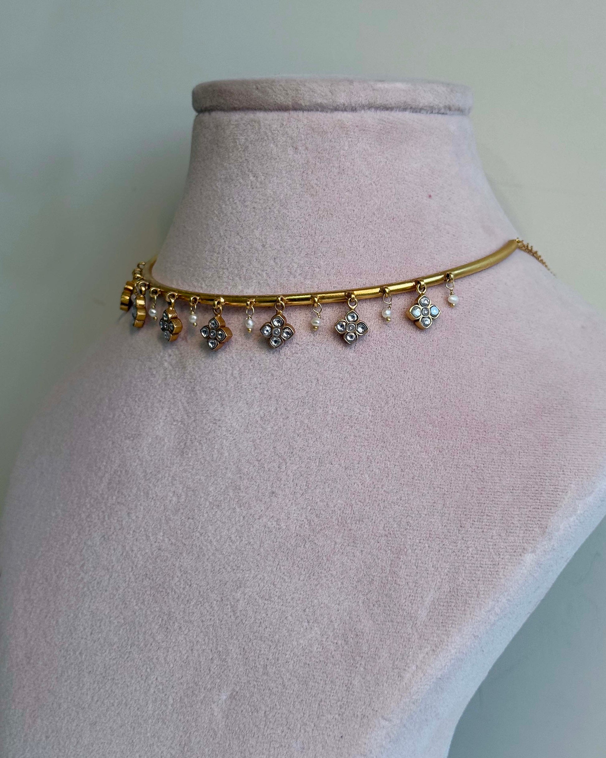 Nuvi Jewels designer Madhura Hasli in 92.5 silver featuring handcrafted floral motifs and dangling pearls