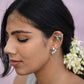 Handcrafted Nuvi Jewels Menaka Earcuffs in 92.5 silver featuring stud and cuff flower motifs with delicate chains
