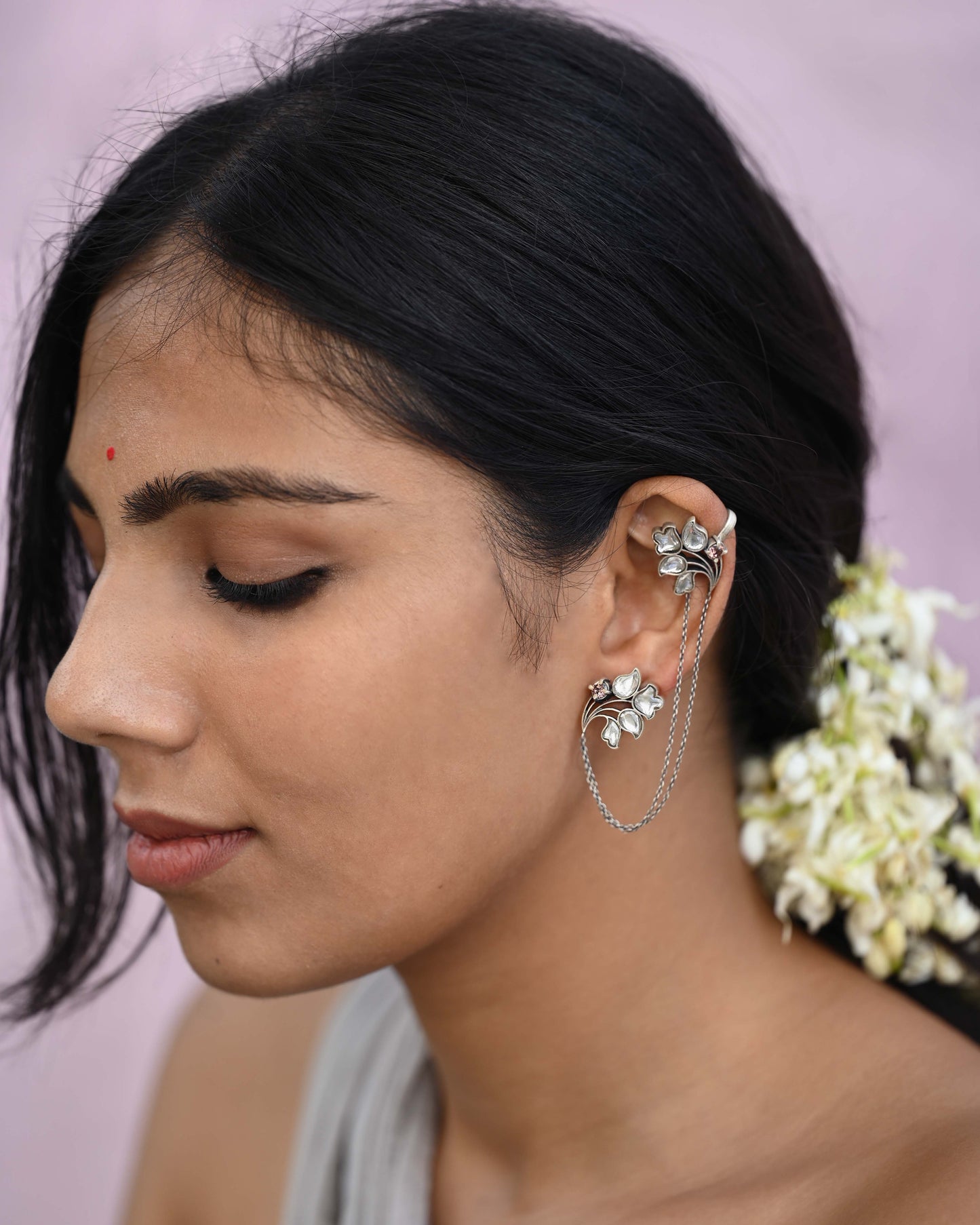 Handcrafted Nuvi Jewels Menaka Earcuffs in 92.5 silver featuring stud and cuff flower motifs with delicate chains