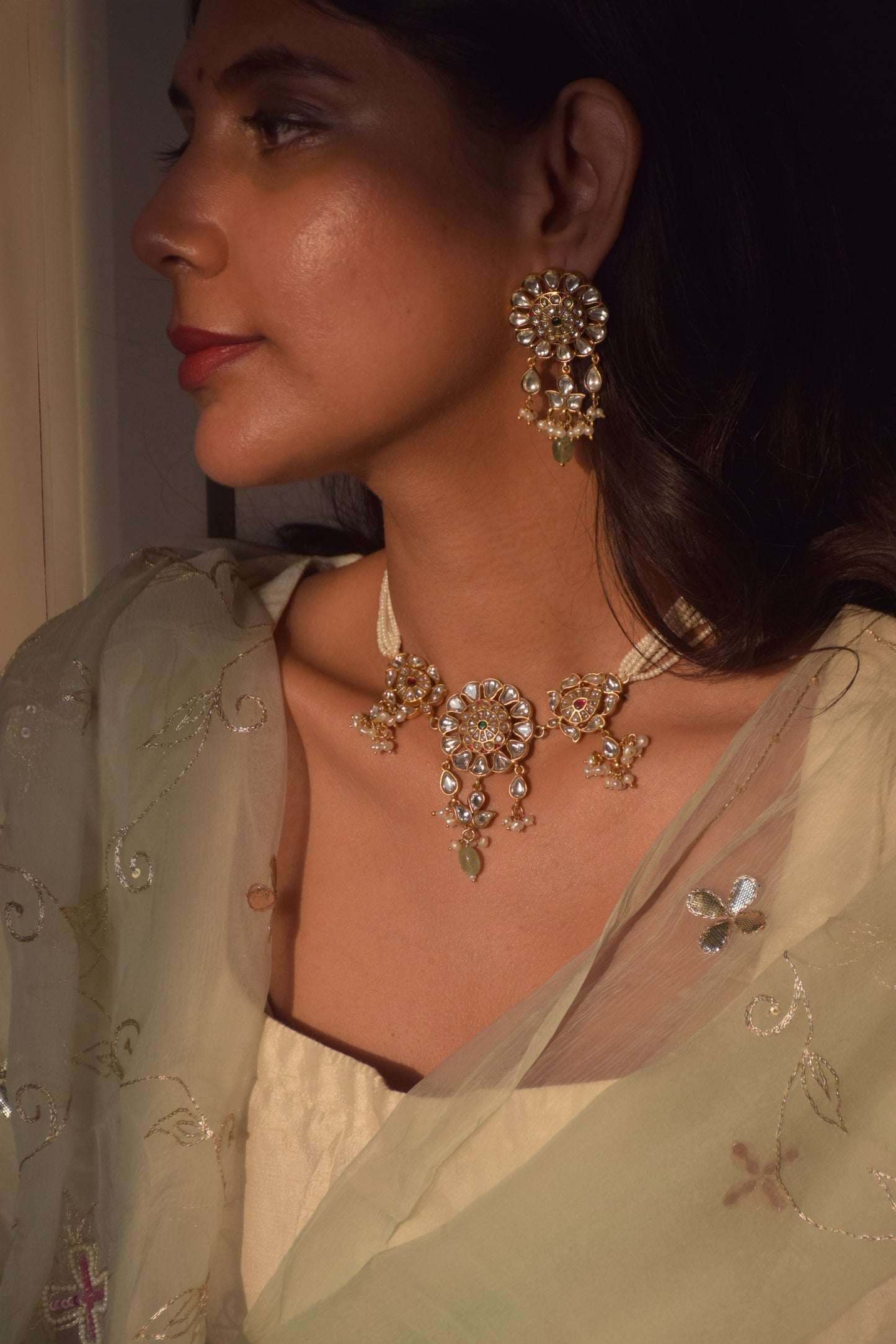 Colorful Jadau Nagma Earrings crafted in 925 silver, featuring hand-cut stones for a mesmerizing, eye-catching look, perfect for weddings and ethnic styling.