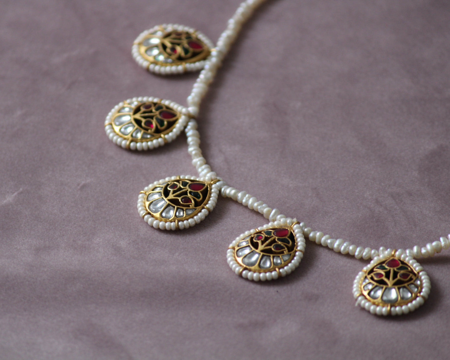 Traditional yet modern Pankhudi Necklace by Nuvi Jewels, featuring Jadau petals and pearl detailing on gold-plated sterling silver.