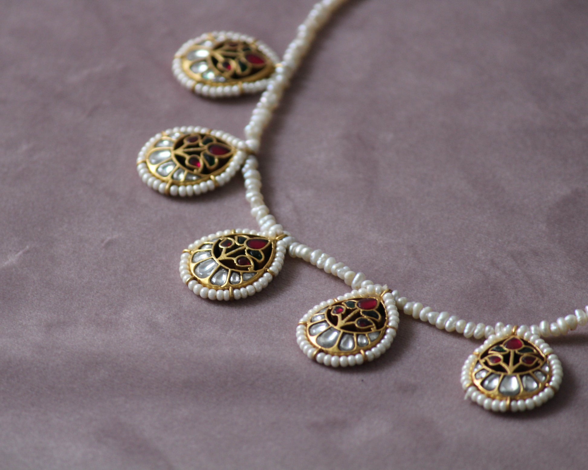 Traditional yet modern Pankhudi Necklace by Nuvi Jewels, featuring Jadau petals and pearl detailing on gold-plated sterling silver.