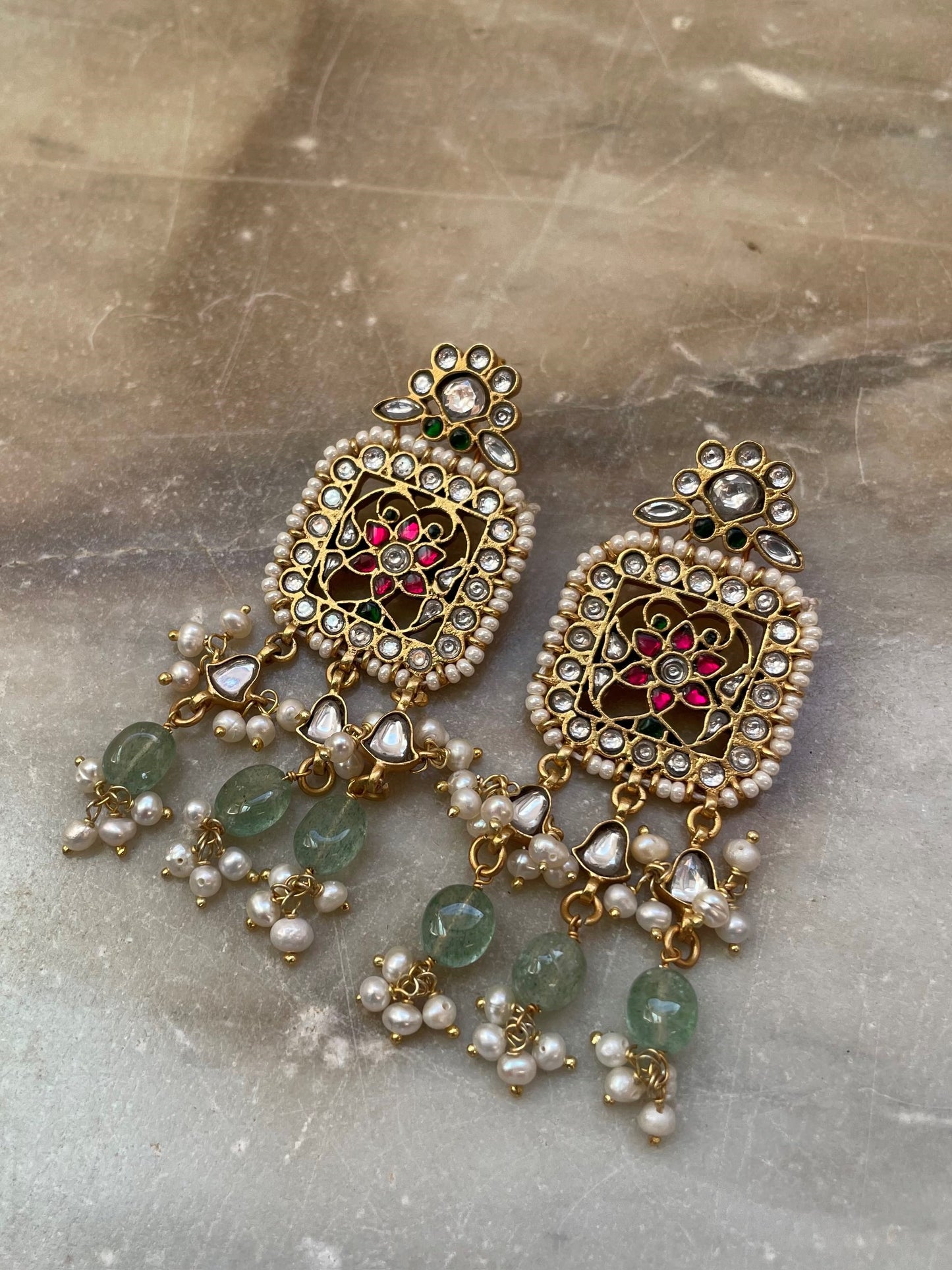 Regal Rani Earrings in 925 silver with Jadau stones, showcasing intricate craftsmanship and Rajasthan-inspired design, perfect for traditional Indian weddings and festive ensembles.